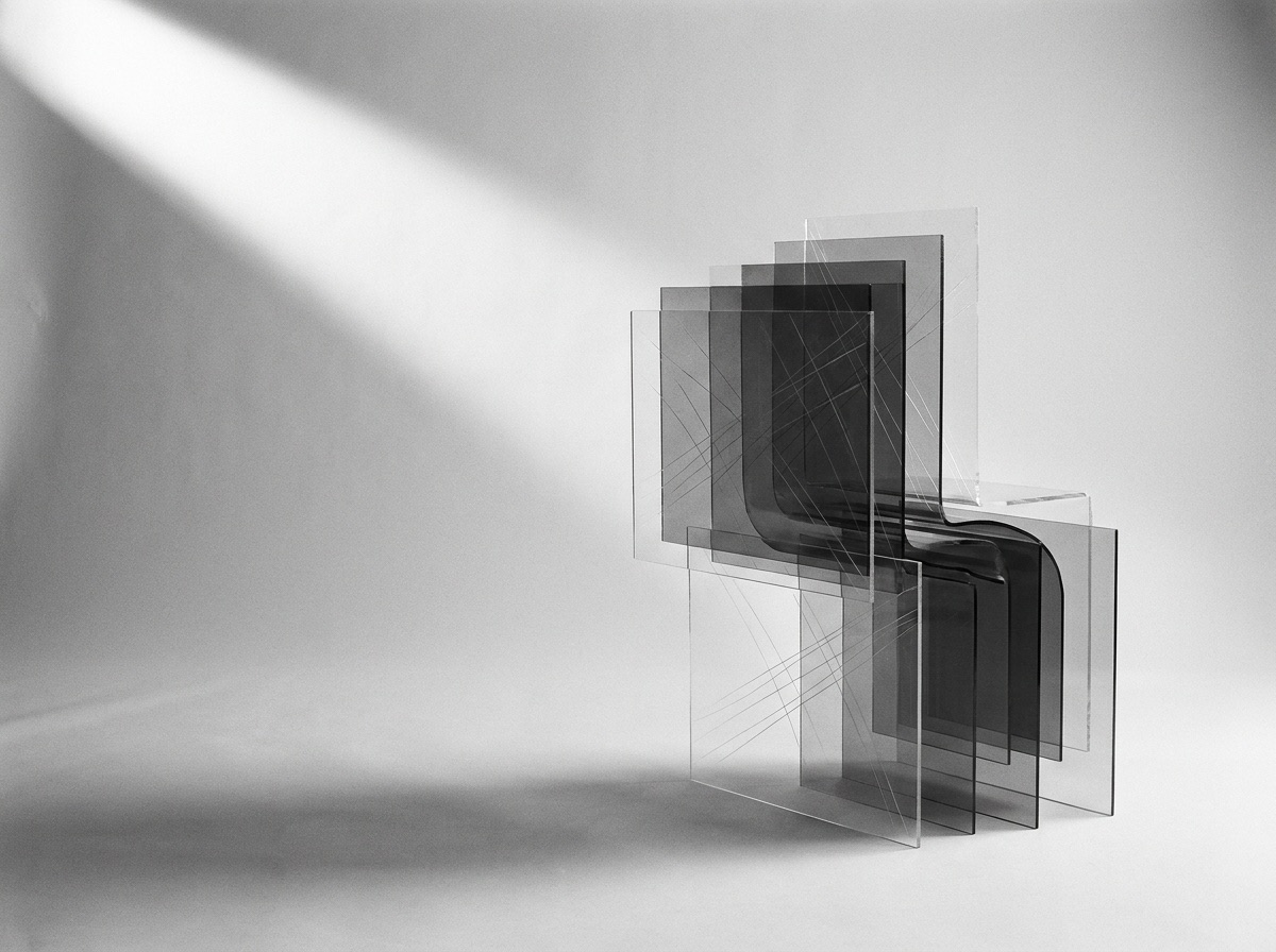 Abstract monochrome render of layered translucent planes suggesting cargo routes